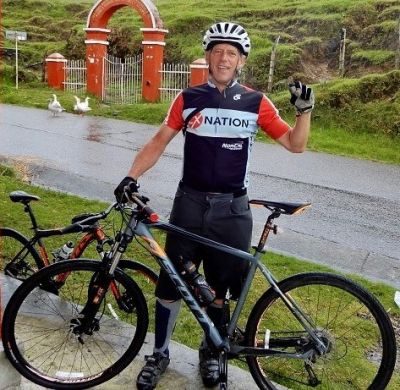 Robert Travers Cycling on the  tour with redspokes